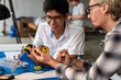 © Rawpixel.com - Collaborative robotics project teamwork photo