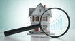 © Abrar - A Magnifying Glass Inspecting a Miniature House with Rising Bar Graph, Symbolizing Real Estate Market Growth and Property Investment Analysis.
