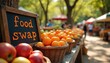 © Pete - Food swap event at park market with fresh apples and oranges in baskets. People exchange produce on sunny day. Community gathers for sustainable eating.