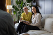 © ReeldealHD images - Women in a business meeting using a digital tablet