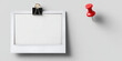 © Pranjul - Blank white polaroid instant photo frame pinned with a red pushpin thumbtack, isolated on a transparent background for mockups and creative designs.