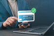 © Nirusmee - Secure online payment concept with man using smartphone for e-commerce credit card transaction, representing digital wallet, mobile payments, and safe financial technology.