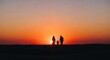 © ashan - Family Silhouette Walking Towards Sunset in Desert Landscape, International Family Day