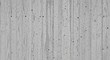 © yopie - High-detail close-up of rough, textured concrete wall with visible imperfections