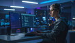 © SolaruS - Dedicated female programmer writing code on dual monitors in a cinematic night office. Ideal for themes of cybersecurity, digital innovation, software development, and STEM career success.