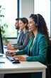 © Pete - Customer service agents wearing headsets work at computers in bright call center. Smiling diverse team members assist clients with online support, consultations. Use technology for effective