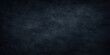 © hossain - A dark blue grunge background features a textured vintage wall pattern with an aged black paper surface and rough dirty backdrop design