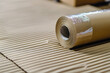 © SunCamCo - Packaging Tape Macro Extreme close-up of a tape gun sealing a cardboard box