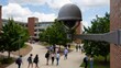 © Kitta Studio - Security Camera Overseeing Students on Campus Pathway During Daytime