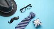 © Papia Begum 123 - Celebrating father's day stylish accessories hat glasses tie and gift for dad's special day