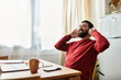 © LIGHTFIELD STUDIOS - Joyful moment of a handsome man enjoying peace at home in warm morning sunlight