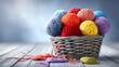 © vectorizer88 - Colorful Dyed Yarn Balls in a Basket Against a Soft Background