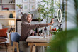 © Jovo Jovanovic/Stocksy - Muslim woman filming beauty tutorial with ring light.