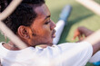 © Jovo Jovanovic/Stocksy - Tired soccer player rests