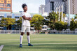© Jovo Jovanovic/Stocksy - Soccer player confidently standing