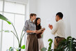 © Nuria Seguí/Stocksy - Team collaboration in a corporate setting