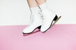 © Colour Laboratory/Stocksy - Person wearing winter sport skaters with hard direct flashlight