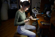© Olga Murzaeva/Stocksy - a woman makes jewelry