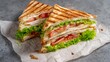 © PRI - Deliciously Layered Diagonal Cut Sandwich with Fresh Ingredients and Fillings