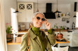 © Alba Studio/Stocksy - Senior woman posing for social media