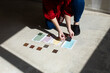© Jimena Roquero/Stocksy - Anonymous decorator deciding options for space renovation