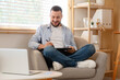 © Pixel-Shot - Male interior designer working with graphic tablet in office