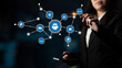 © InfiniteFlow - A professional woman interacts with digital networking icons, illustrating modern business connections and collaborations. This image represents innovation and strategic growth. Tessel