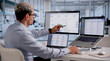 © Andrey Popov - ERP Expert Evaluates Cloud-Based Integrated Management Software On Laptop