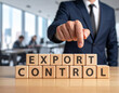 © magele-picture - Export Control - Geschäftsmann zeigt auf das Wort 'Export Control'
