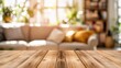 © Kristina - Empty light wooden table top with blurred cozy living room background