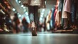 © sup - Woman walking in clothing store
