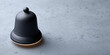 © Anastasiya Marchenko - Modern black service bell on concrete