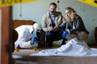 © Dejan - Forensic investigators and detectives examining a crime scene, collecting evidence, and documenting details of the case