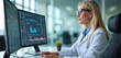 © miss irine - Elderly woman in glasses analyzes data on dual computer screens. Healthcare pro reviews charts and graphs on monitors, working in office. Focused senior female examines medical info.