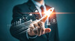 © farhan - Businessman's hand ignites a digital rocket symbolizing startup launch and rapid business growth, illustrating success, innovation, and strategic vision for future expansion, driving progress and achi