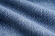 © AkuAku - high resolution close up of classic blue denim textile texture with natural fiber details