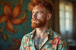 © Vadym - Red haired man with beard and tattoos wears floral shirt at home. He has neck ink and chest art. Man looks away thoughtfully in casual indoor setting. Bearded guy appears relaxed.
