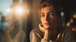 © Lemonkey - Thoughtful young woman sitting by window with sunlight reflection, expressing contemplation, emotional mood, and modern lifestyle atmosphere indoors