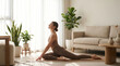 © realbkk - Woman Practicing Pigeon Pose Yoga in Bright Minimal Living Room