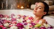 © Sajeduil - A smiling young woman enjoys a natural wellness treatment while lying down at a luxury beauty spa for skin care and body relaxation with rose flowers