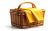 © Andi - A rustic wicker picnic basket filled with bright yellow cloth sits against a clean white background, evoking feelings of warmth and leisure.
