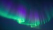 © wiwat01 - Mesmerizing Display of Aurora Borealis in Vibrant Greens and Purples Lighting up the Night Sky