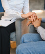 © Serhii - Psychologist supporting patient during therapy session