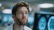 © Jaroon - Focused Medical Insight: A dedicated doctor peers intently at the details of a medical scan, embodying the concentration, competence, and compassion inherent in healthcare