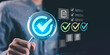 © Nichaphat - Quality auditor inspecting checklist and verifying compliance using digital tools, focusing on performance evaluation, and ensuring reliable and consistent business quality standards and operations.