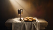 © HASSAN - Communion bread and cup on table with soft light representing faith and tradition