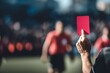 © vetrana - Referee shows red card during match in stadium with crowd on a sunny day