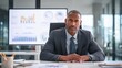 © vladim_ka - Chief financial officer reviews analytics data at executive desk in modern office setting
