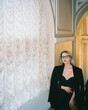 © Asya Molochkova/Stocksy - Stylish Woman Portrait in Film Look Interior