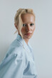 © Serge Filimonov/Stocksy - Beauty portrait woman looking at camera white background
